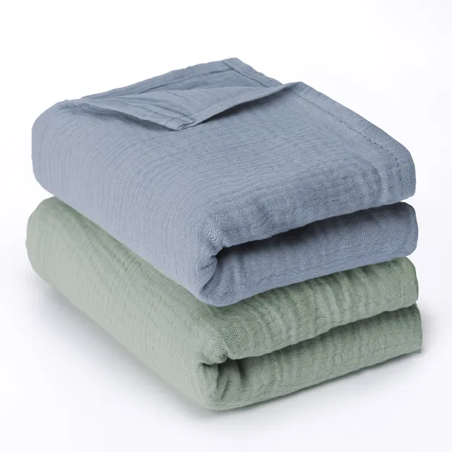 haakaa-muslin-swaddle-blankets-2-pack-100-cotton-double-layer-baby-receiving-bla image 1