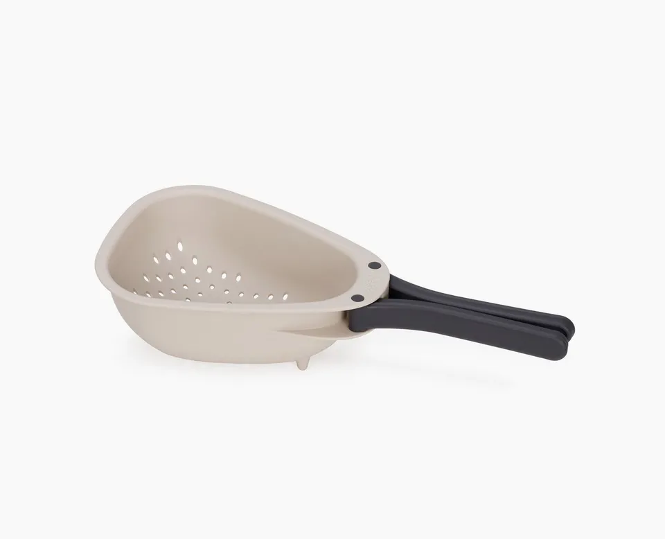 joseph-joseph-droplet-mini-white-colander-with-folding-handle image 1