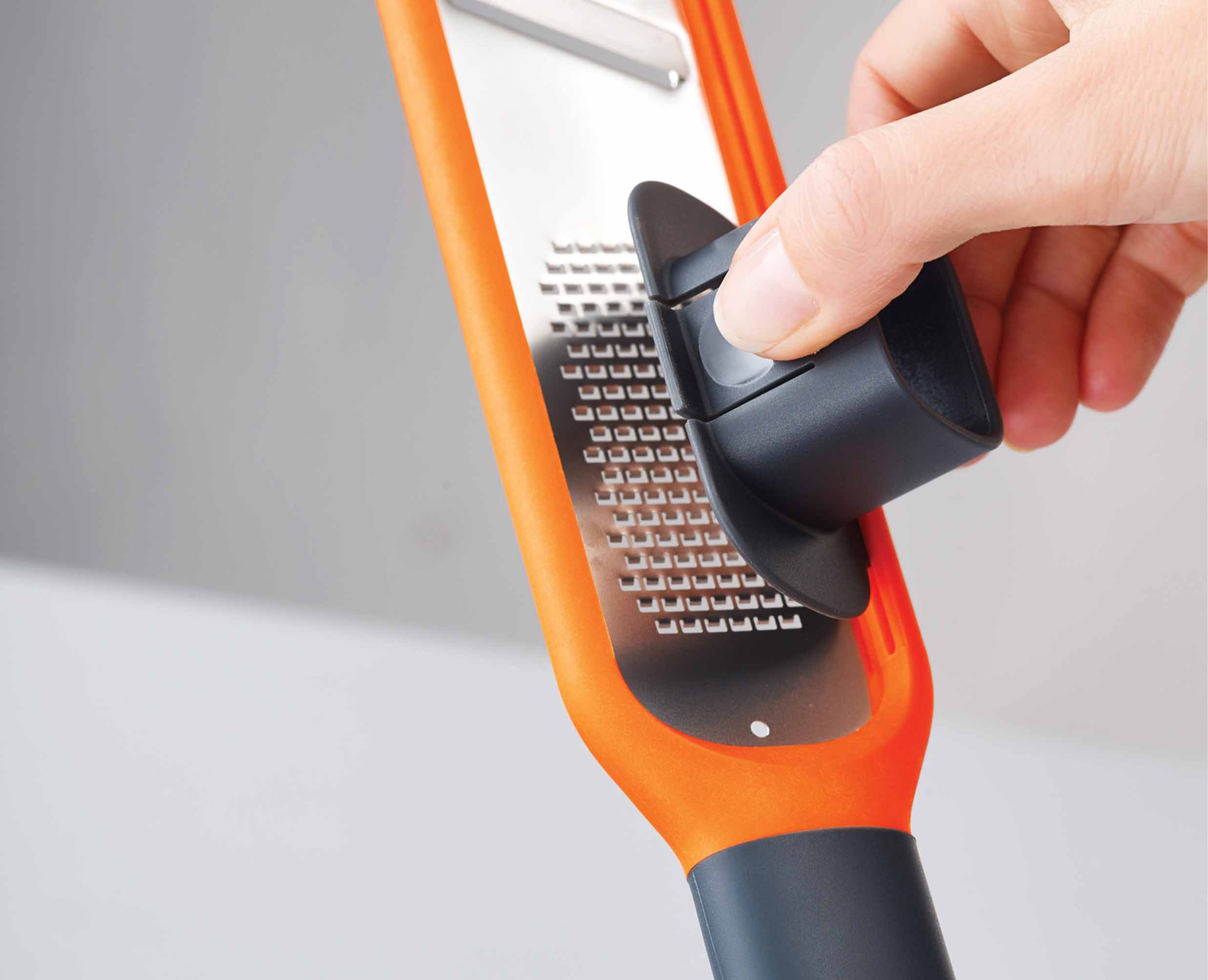 joseph-joseph-handi-grate-orange-2-in-1-mini-grater-slicer image 5