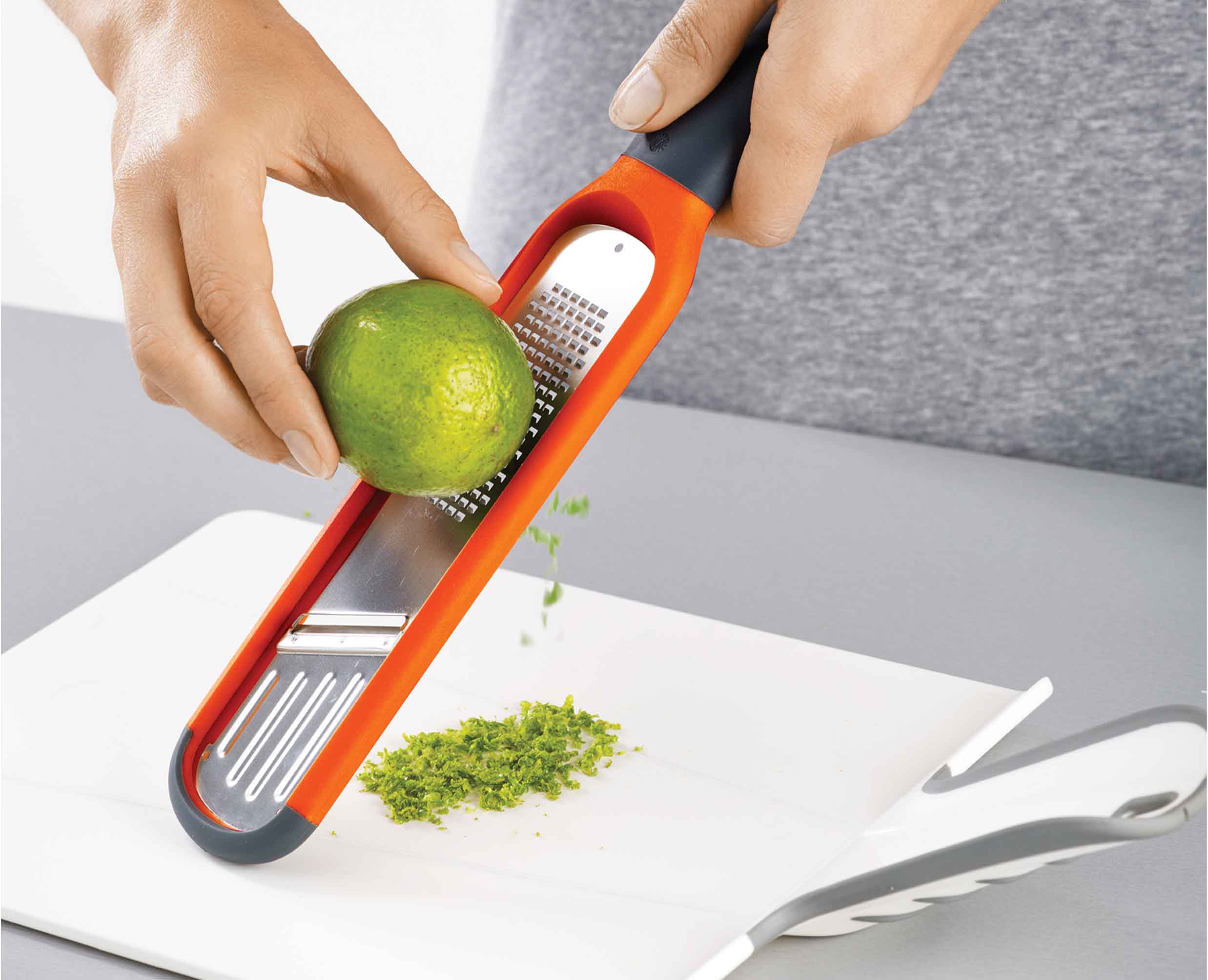 joseph-joseph-handi-grate-orange-2-in-1-mini-grater-slicer image 6