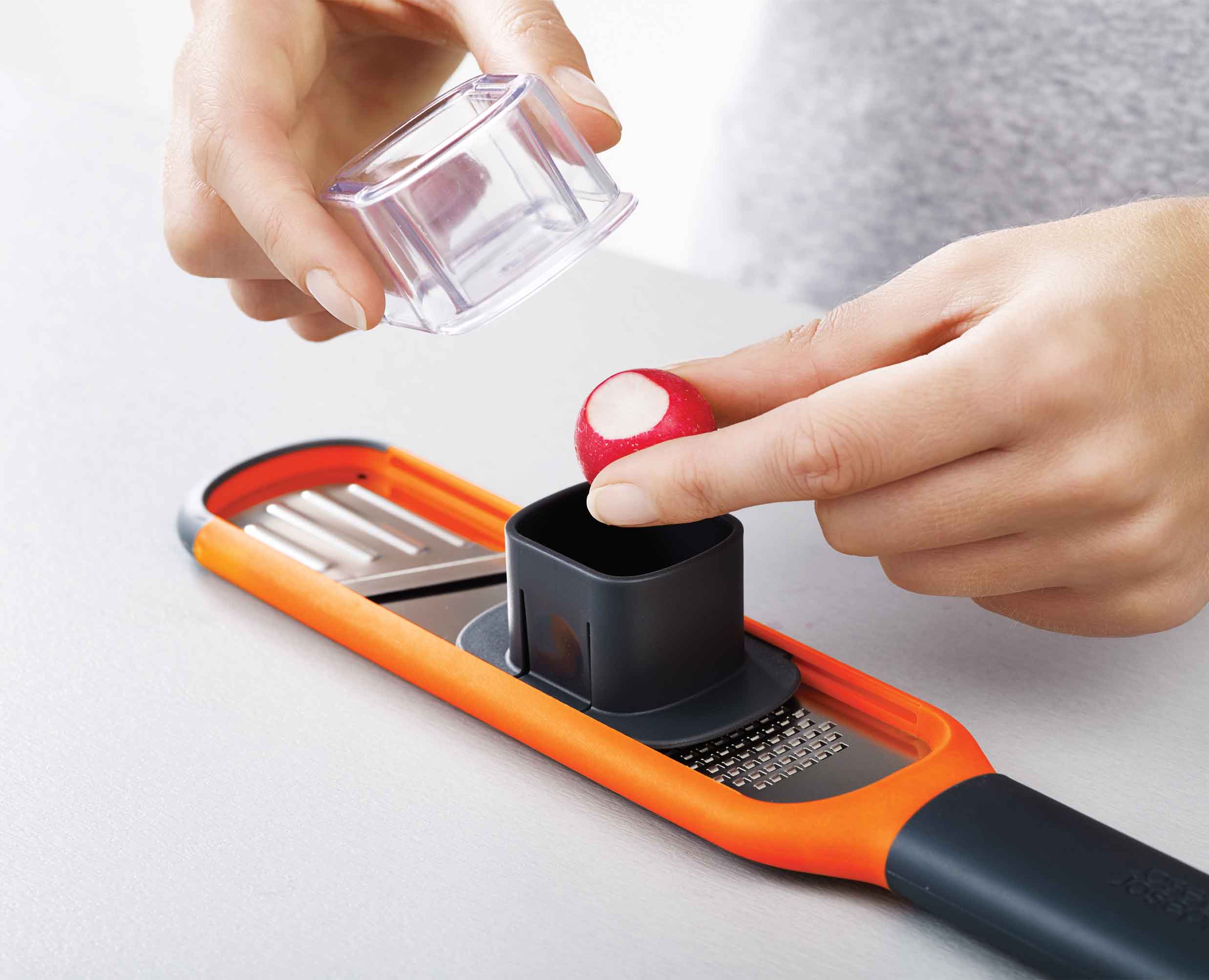 joseph-joseph-handi-grate-orange-2-in-1-mini-grater-slicer image 7