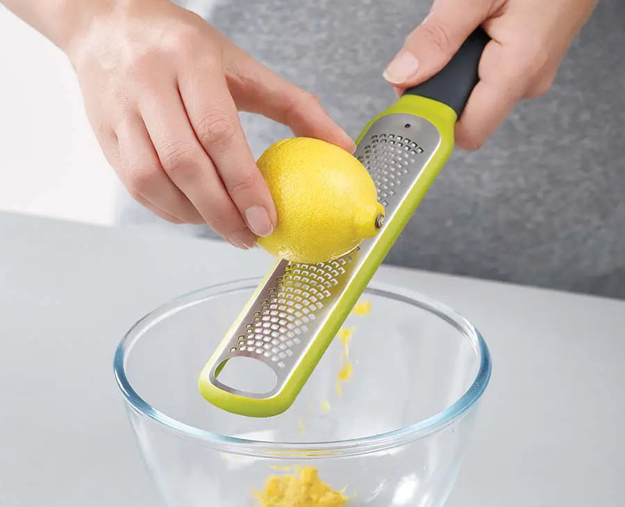 joseph-joseph-handi-zest-green-citrus-zester-with-blade-wiper image 2
