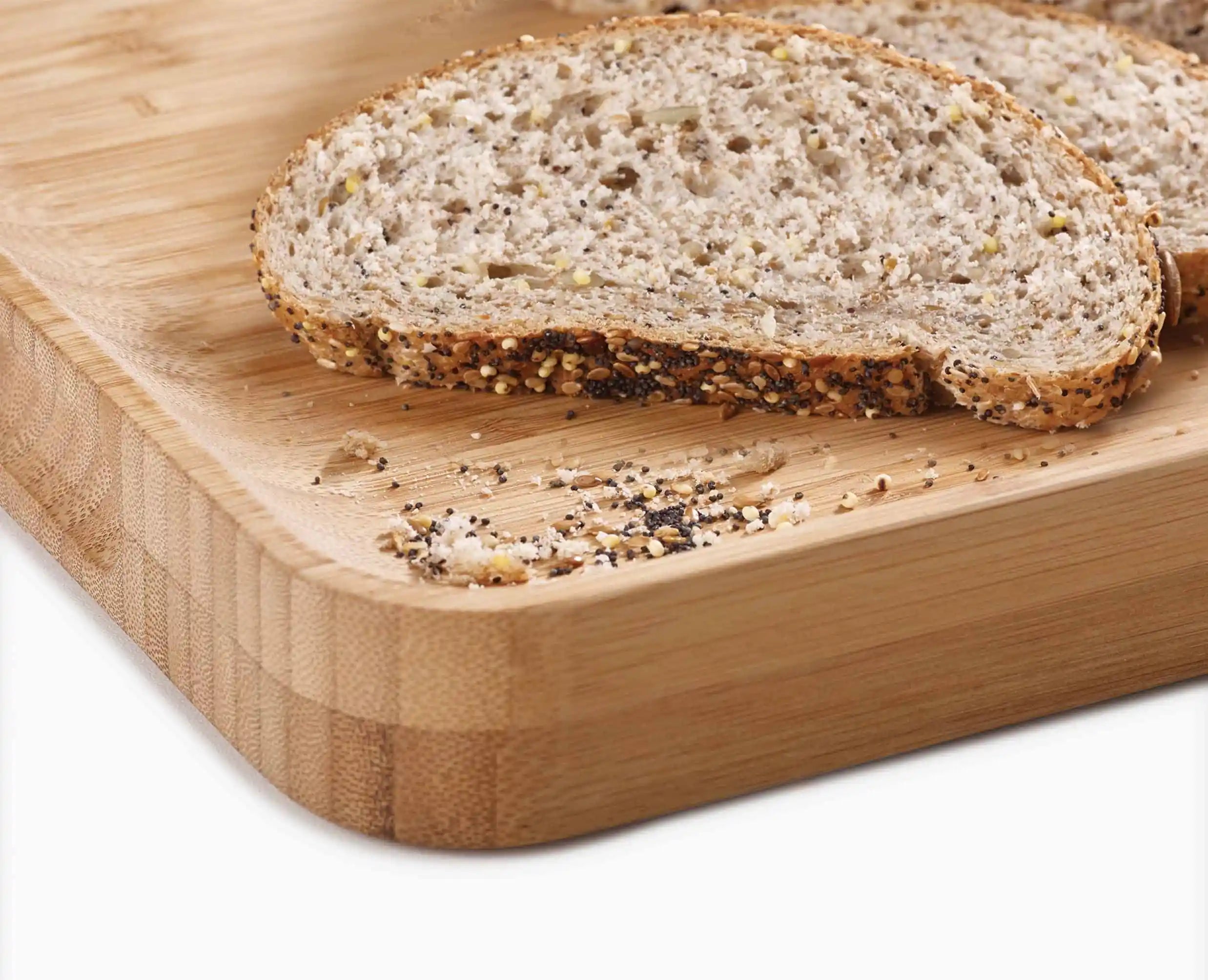 joseph-joseph-cut-carve-bamboo-chopping-board-with-integrated-food-grip image 6
