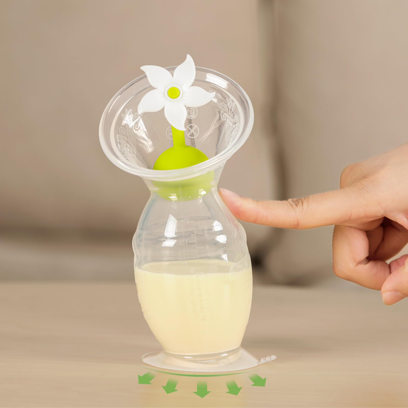 haakaa-manual-breast-pump-silicone-with-suction-base-and-flower-stopper-5oz-150m image 5