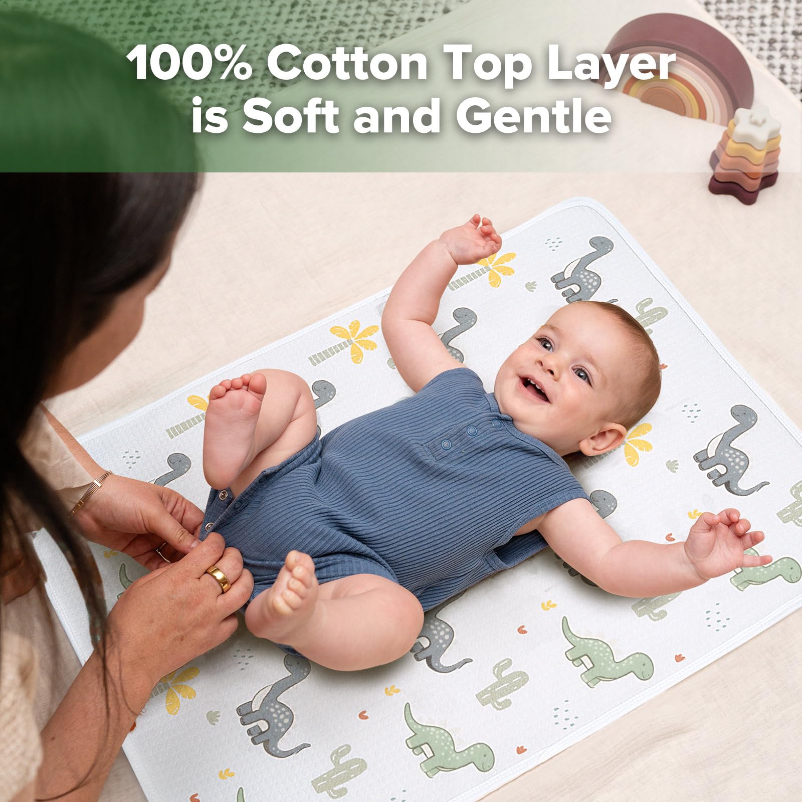 haakaa-waterproof-changing-pad-liner-100-cotton-soft-breathable-19-5-x-27-5-dino image 3